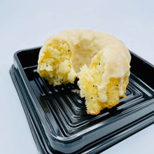 Load image into Gallery viewer, Calamansi Poppy Seed Cake with a bite taken out
